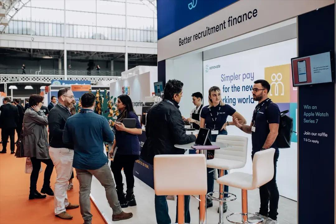 A RecWired partner meeting recruitment founders at a live expo